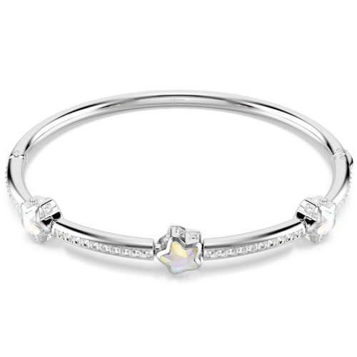 A polished silver bangle bracelet featuring a central silver flower charm with a white inlay, accented by small clear stones along the band, set against a plain white background.