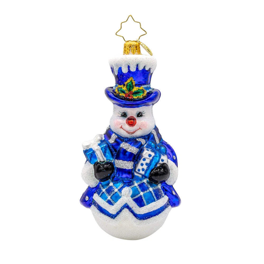 Decorative snowman ornament with blue plaid pattern and top hat on a white background