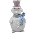 Snowman figurine with a pink top hat and blue scarf 
