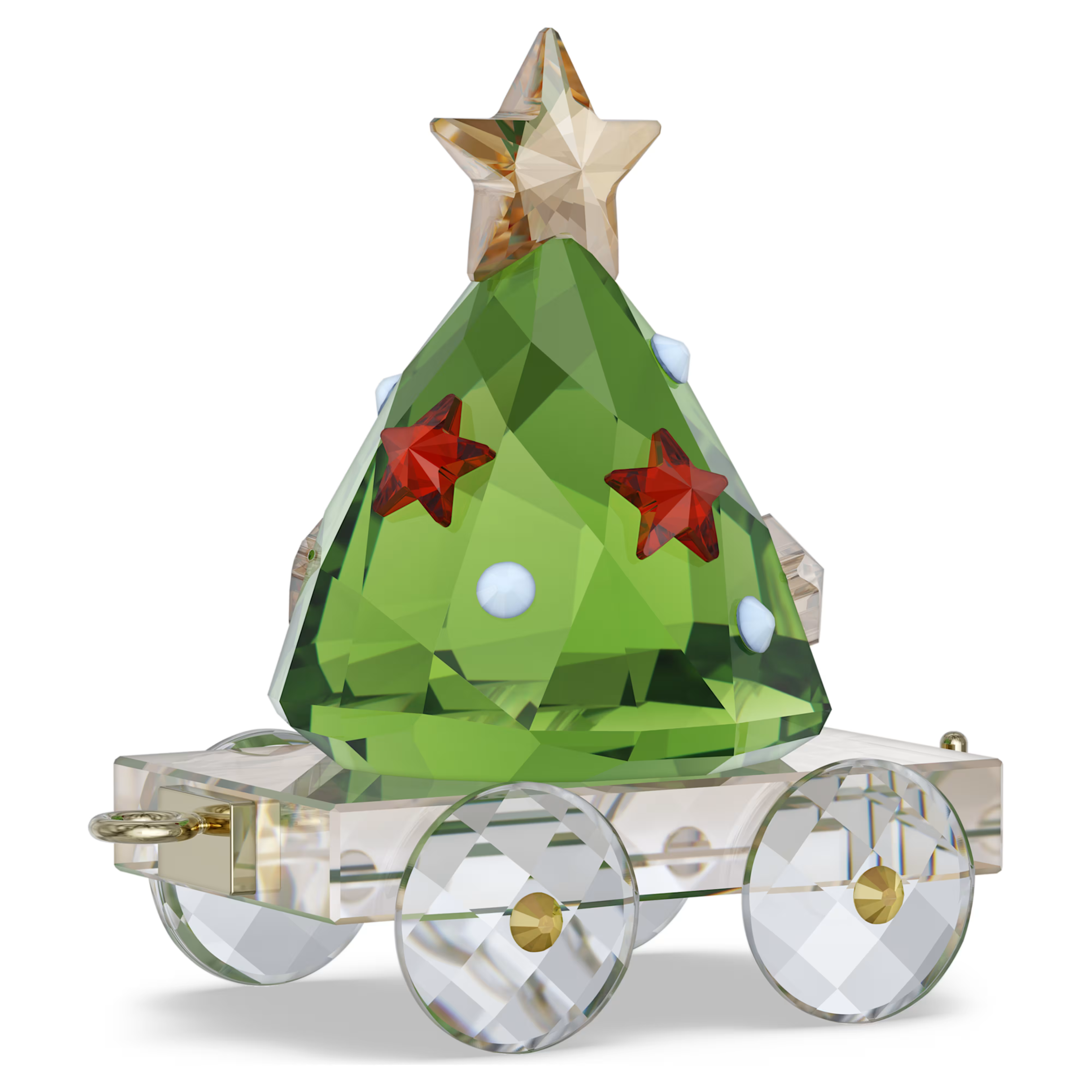 A Swarovski crystal ornament shaped like a green Christmas tree on a clear cart with a faceted gold star on top, shown on a white background.