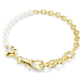 Gold bracelet with heart charm and pearl beads on a white background
