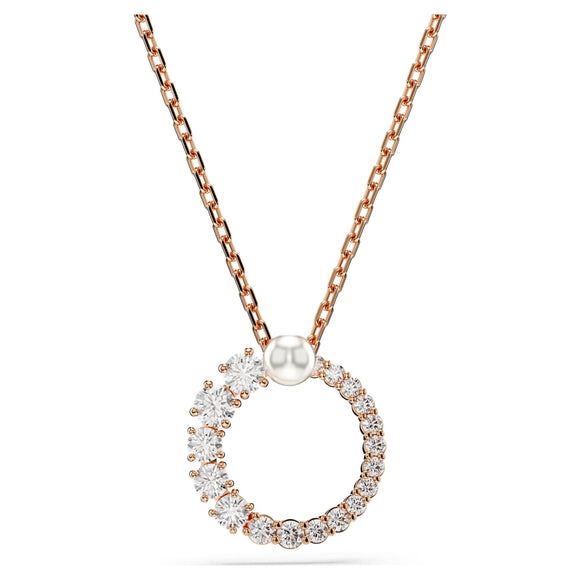 Rose gold necklace with a pendant featuring a pearl and crystals on a white background