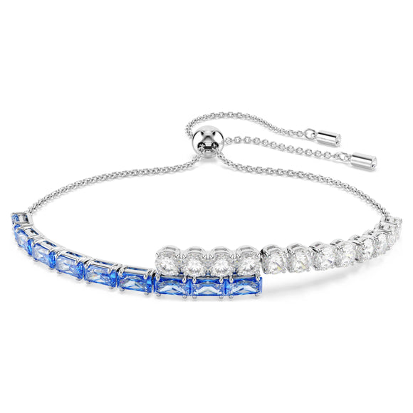 Silver bracelet with blue and clear gemstones on a white background